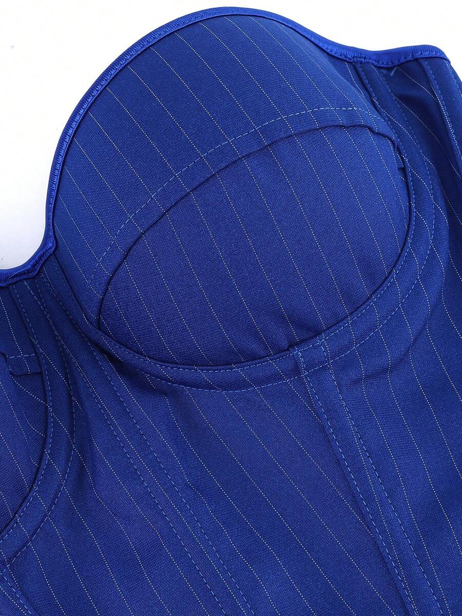 Black overbust corset top with strapless design, boned support, tie-back and zipper closure for women shapewear styling.
