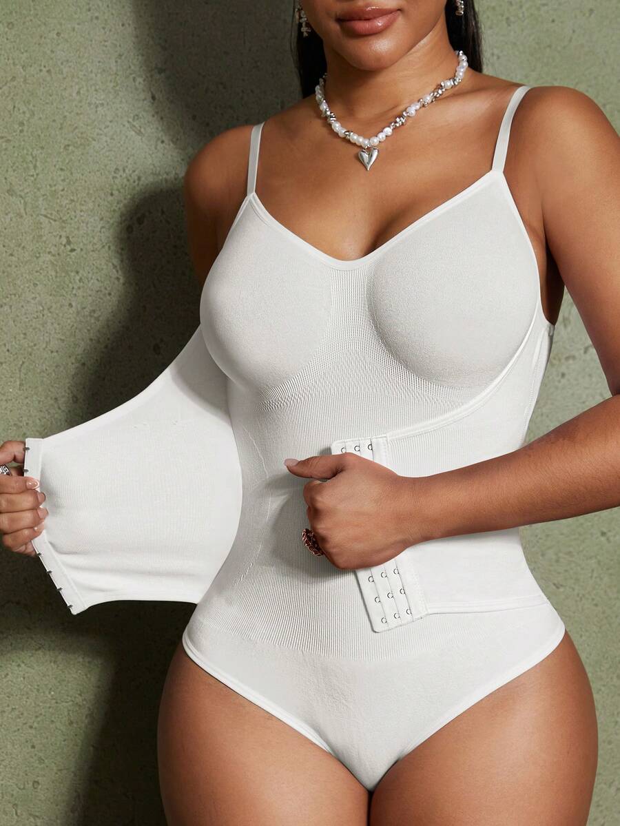 Women's backless waist shaping shapewear bodysuit in black featuring high stretch fabric and ultra light tummy support.