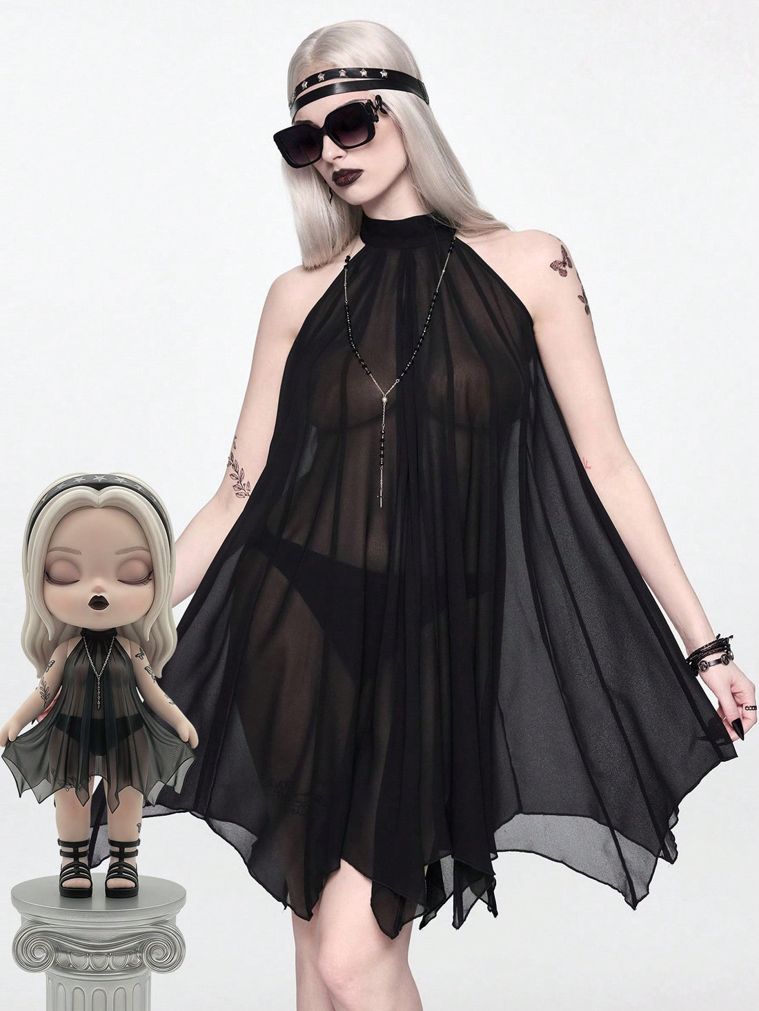 Black sleeveless halter dress for women featuring contrast mesh, sheer chiffon fabric, loose fit, and an asymmetrical hem.