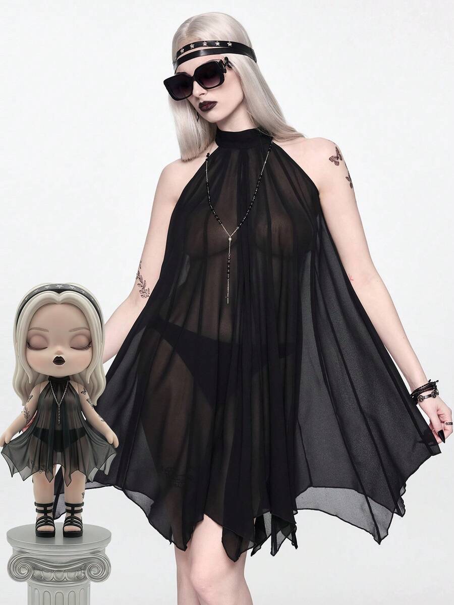 Black sleeveless halter dress for women featuring contrast mesh, sheer chiffon fabric, loose fit, and an asymmetrical hem.