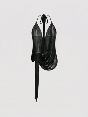 Black sheer mesh halter cami top featuring a backless design, asymmetrical hem, and knot details.