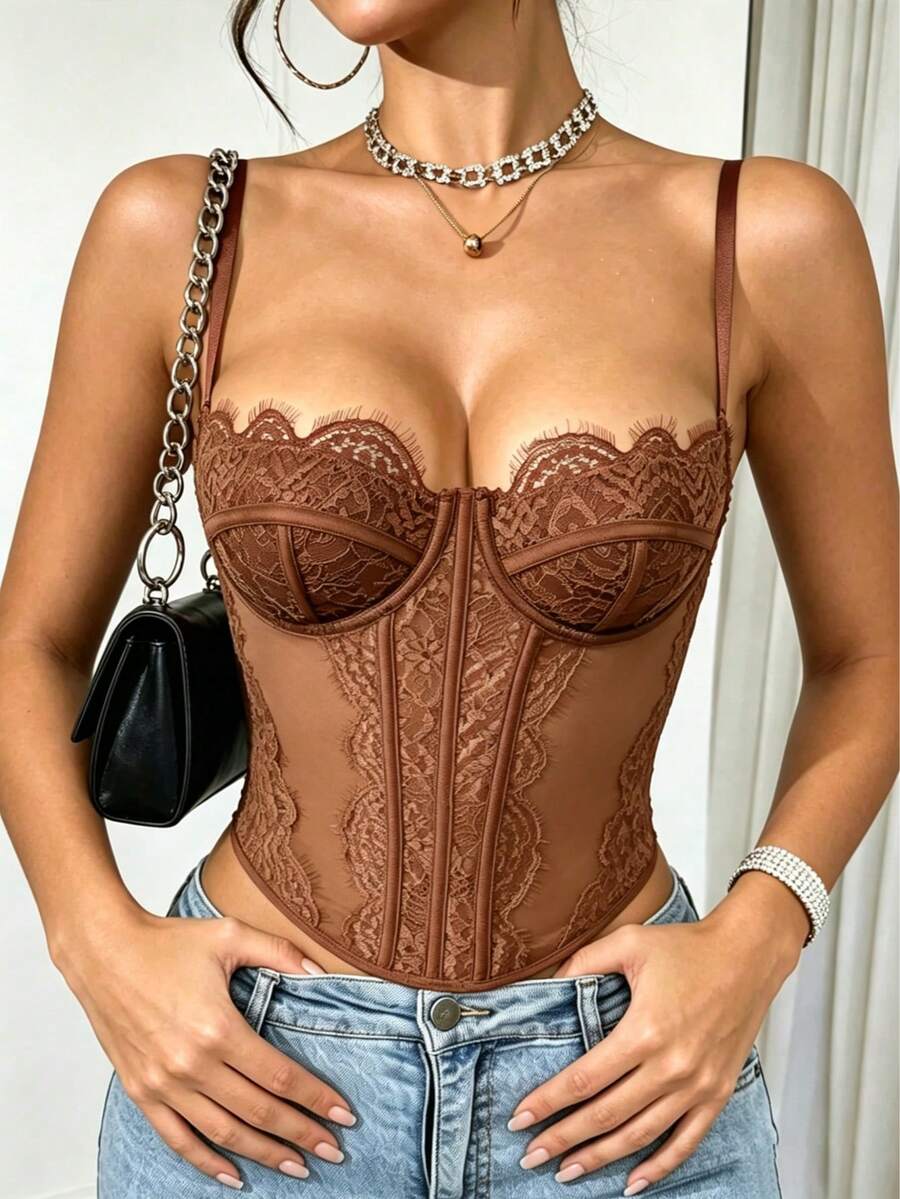 Women's black lace crop camisole featuring a deep V-neckline, slim fit silhouette, and matching arm sleeves.