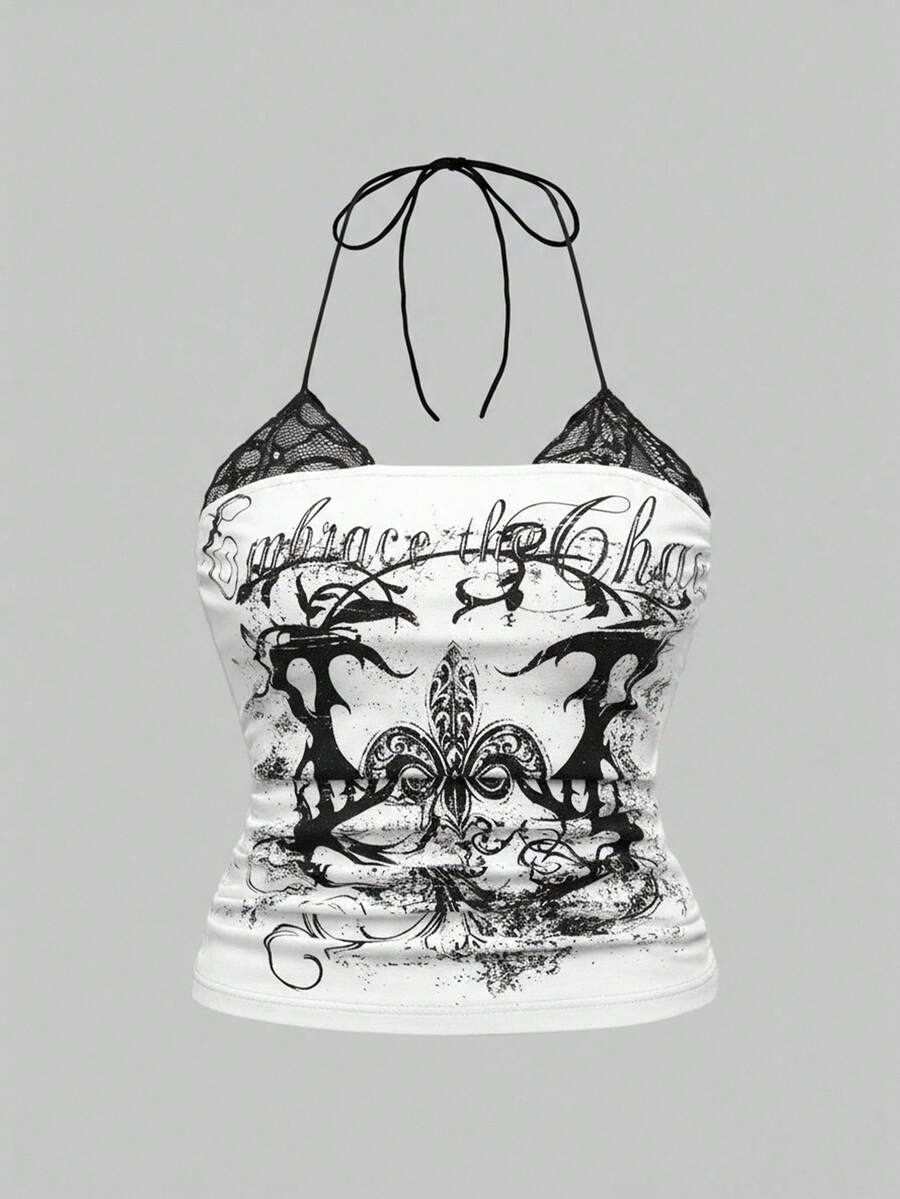 Multicolor graphic crop halter top with contrast lace trim and knot detail in a slim fit stretch knit fabric.