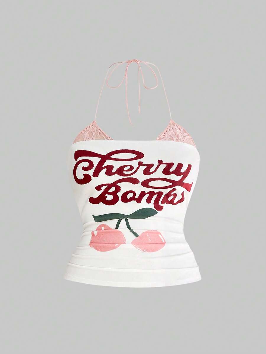 Multicolor graphic crop halter top with contrast lace trim and knot detail in a slim fit stretch knit fabric.