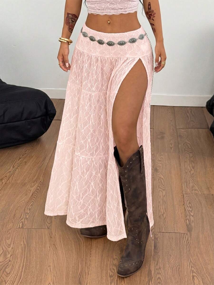 Women's black low waist split thigh long skirt featuring semi-sheer textured fabric and a flared skinny fit.