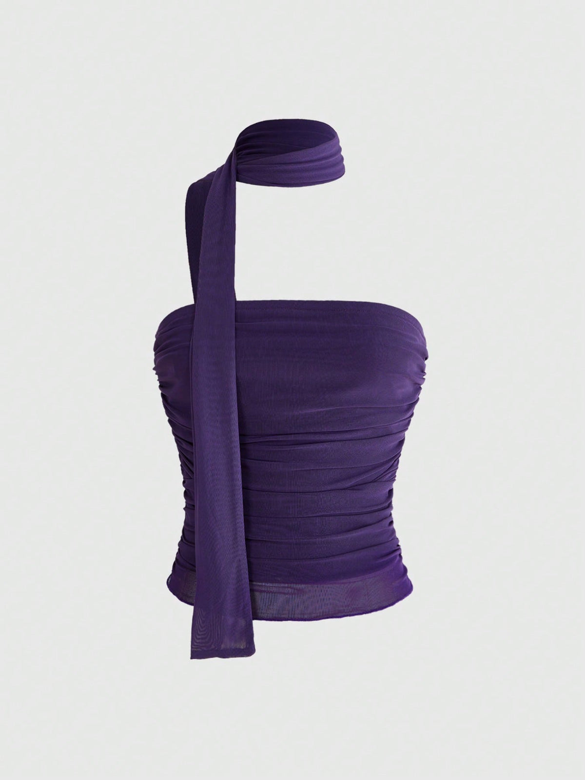 Women's black polka dot strapless tube top made of ruched mesh fabric featuring an asymmetrical hem and matching scarf.