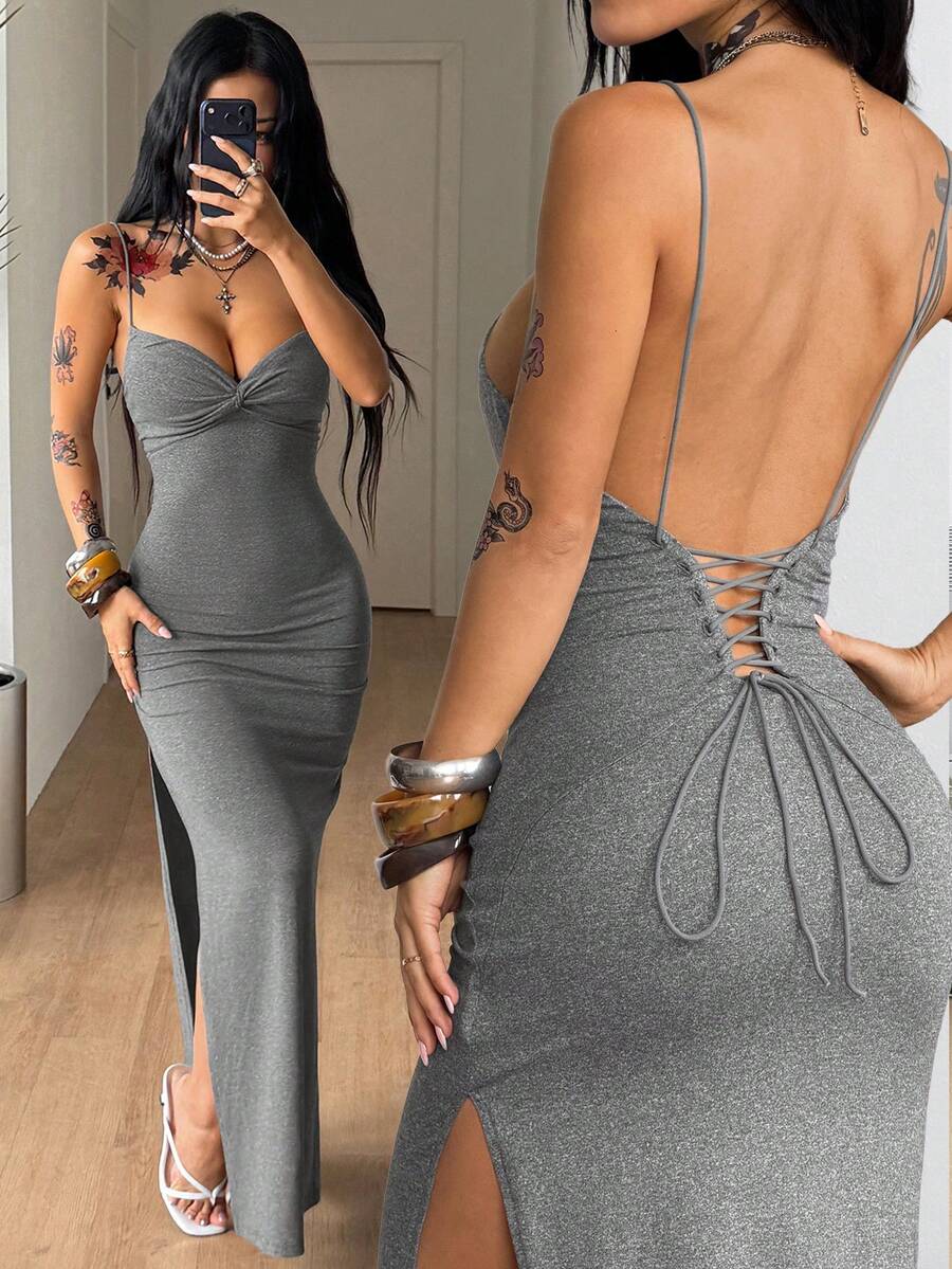 Women's Y2K backless spaghetti strap maxi dress featuring a lace-up back and high split thigh in black knitted fabric.