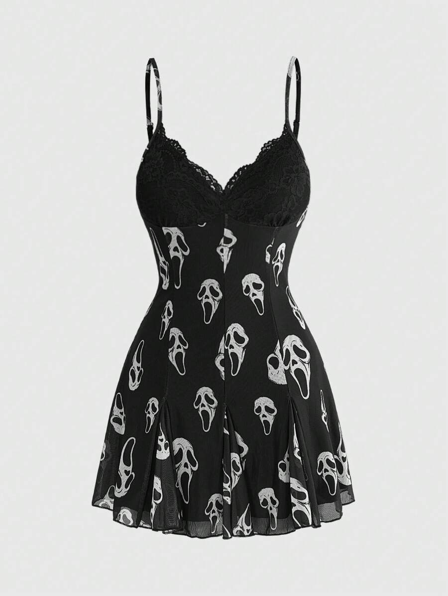 Women's black and white gothic cami mini dress featuring contrast lace trim, pleated details, high waist, and flared hem on high-stretch fabric.