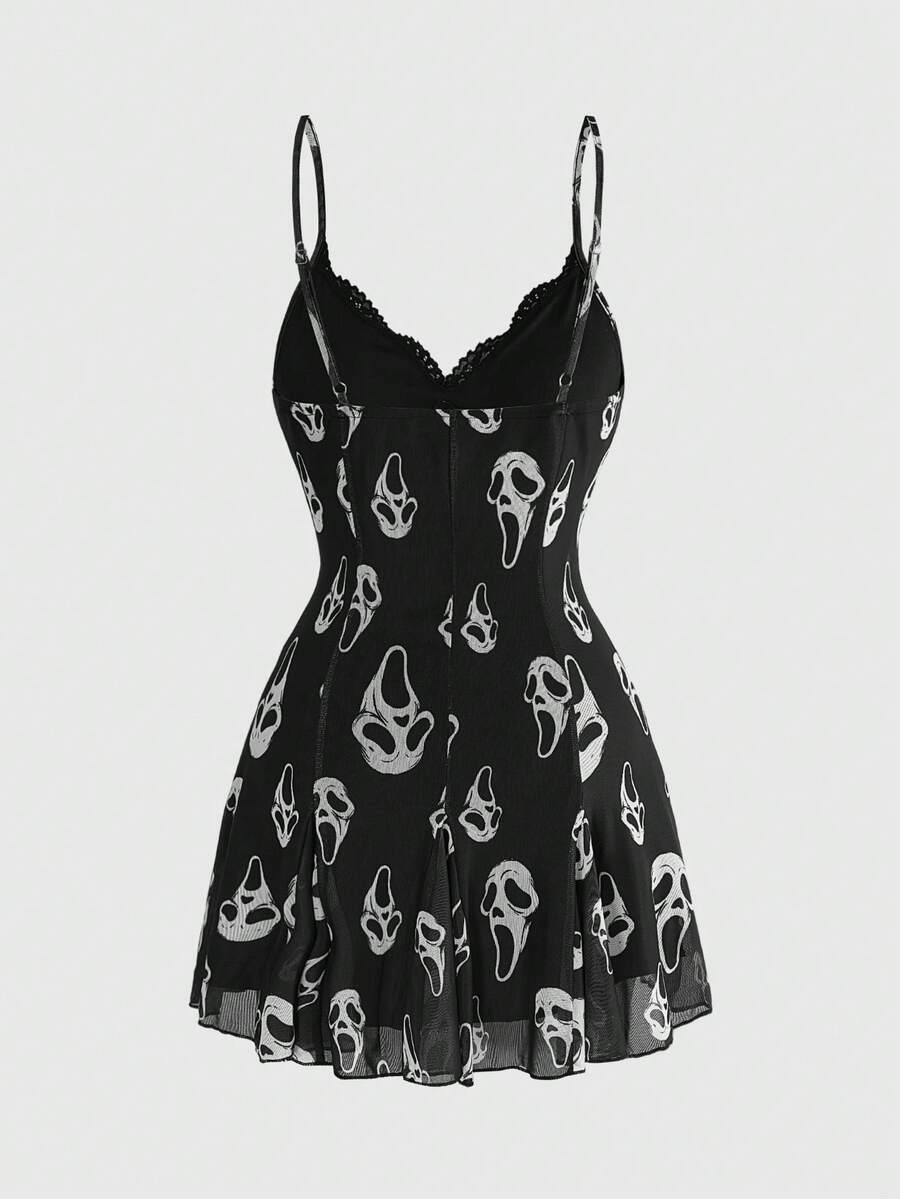 Women's black and white gothic cami mini dress featuring contrast lace trim, pleated details, high waist, and flared hem on high-stretch fabric.