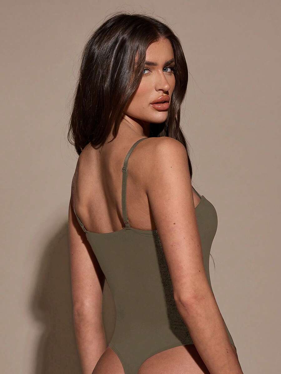 Apricot women's lace sheer camisole top featuring spaghetti straps, contrast lace trim, backless slim fit design, and knitted stretch fabric.