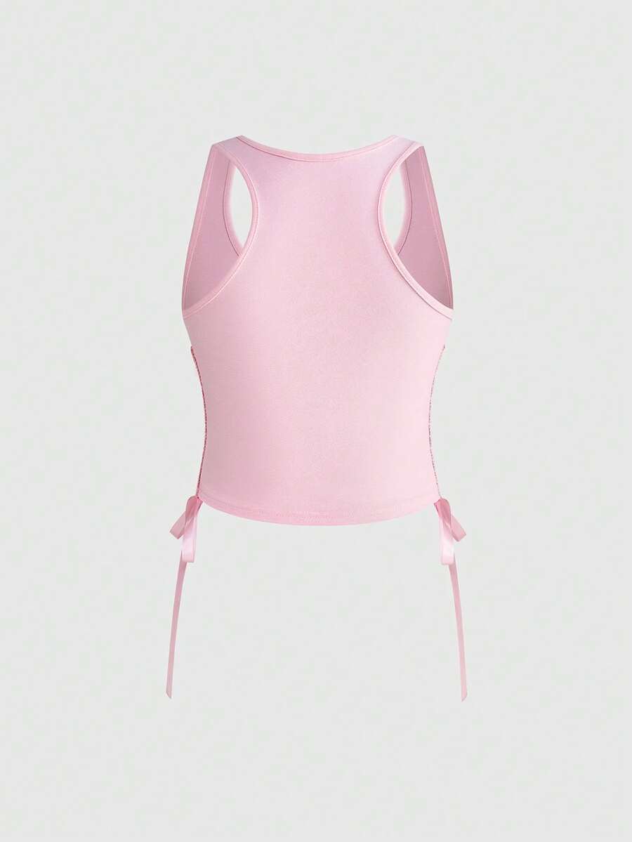Pink slim fit cropped tank top with scoop neckline, featuring cute rabbit and heart print, rhinestone details, and front ribbon bow accent.