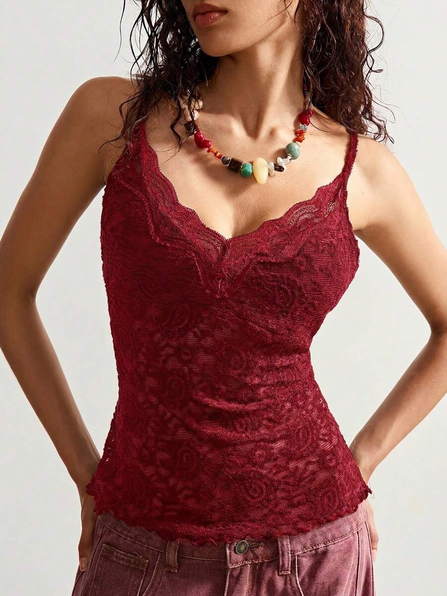 Black boho paisley knit camisole top featuring contrast lace details, spaghetti straps, and a slim crop fit for women