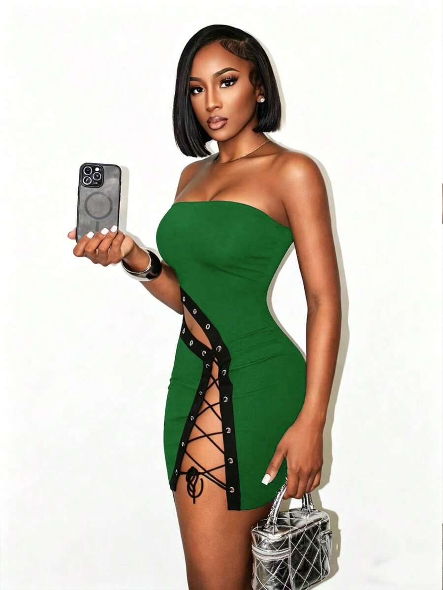 Women's black strapless bodycon mini dress featuring an asymmetrical lace-up design with grommet eyelets and a slim pencil fit.