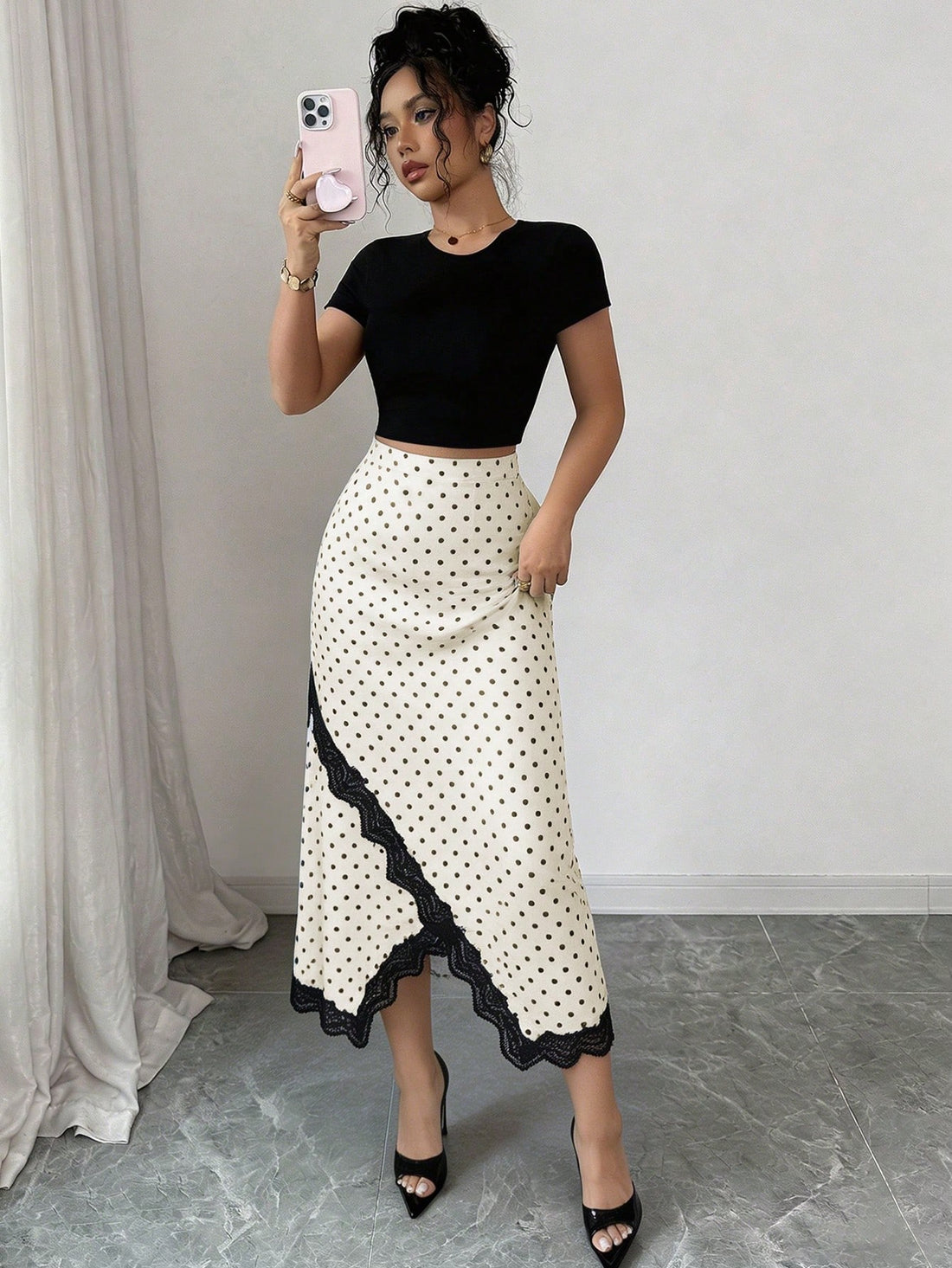women's apricot asymmetrical midi skirt featuring a stylish split detail in knitted fabric.