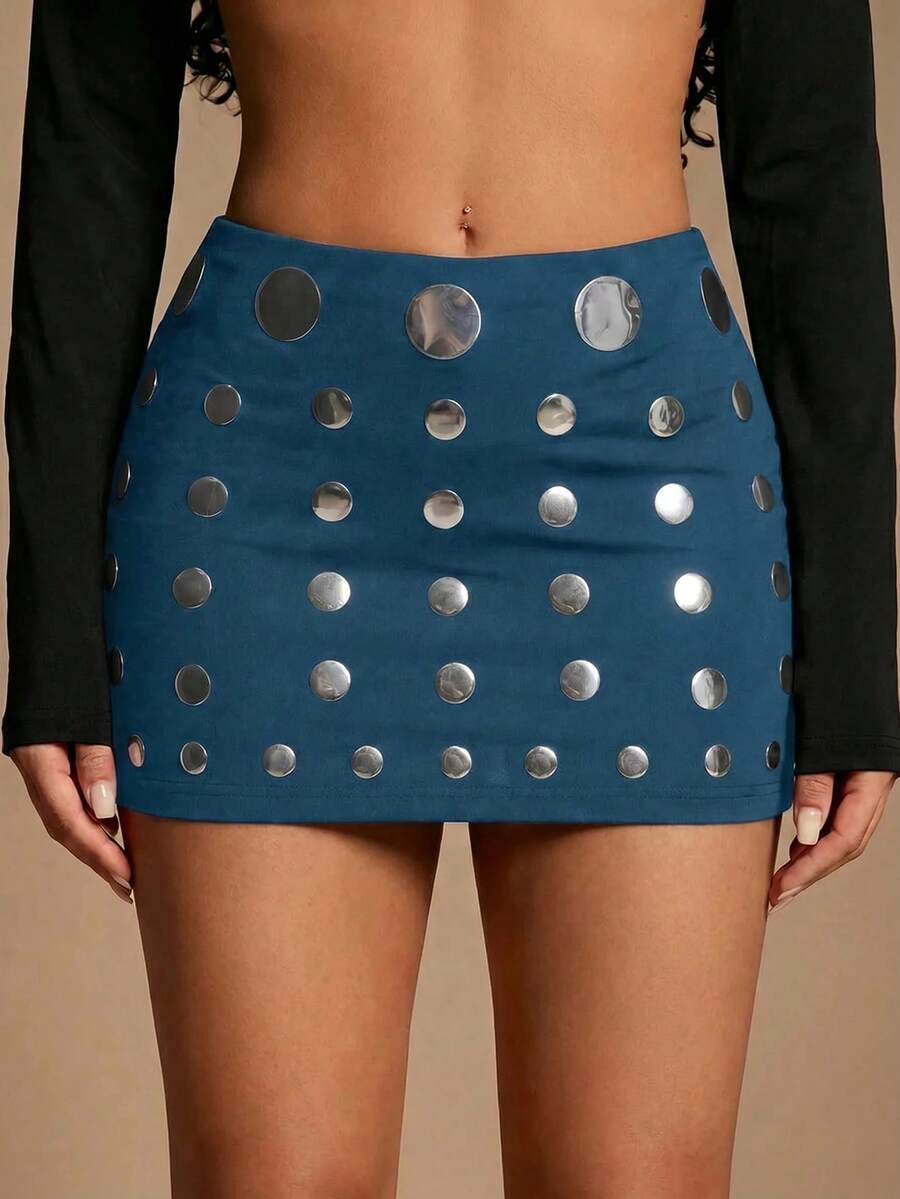 Women's black bodycon mini skort featuring a low waist, pleated side split hem, zipper closure, and built-in shorts.