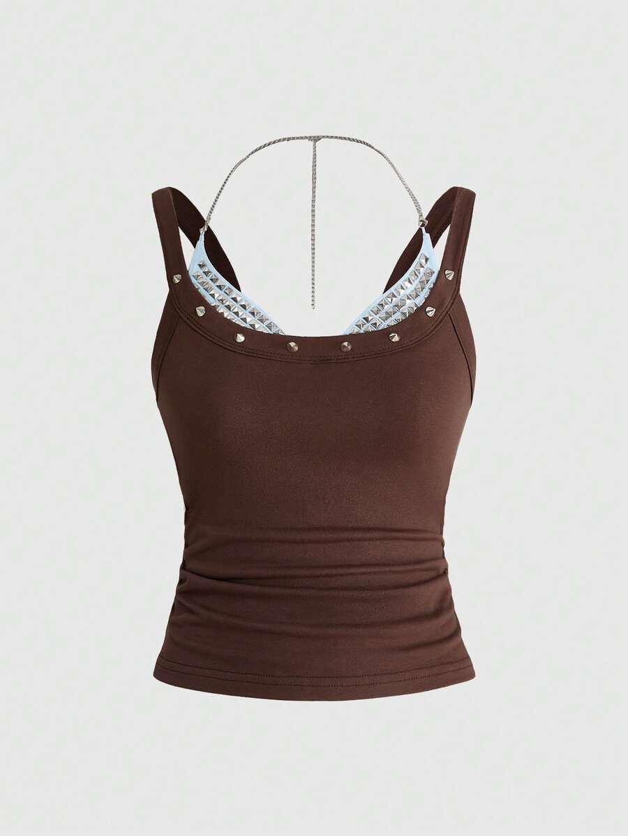 Backless grommet cami tank top featuring slim fit silhouette and strap details on knitted fabric