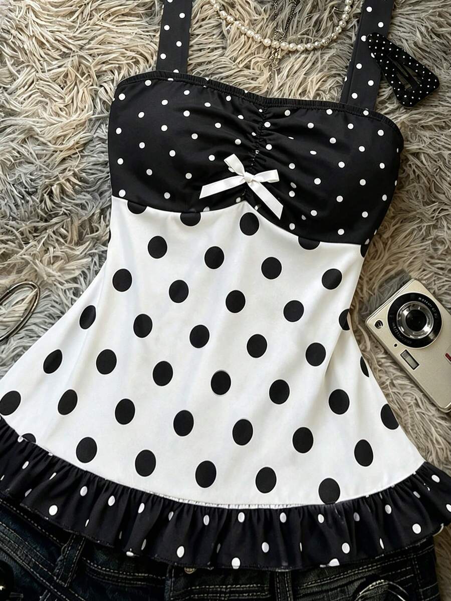 Multicolor women's wide strap tank top featuring polka dot pattern, ruched shirred bodice, and flared ruffle hem.