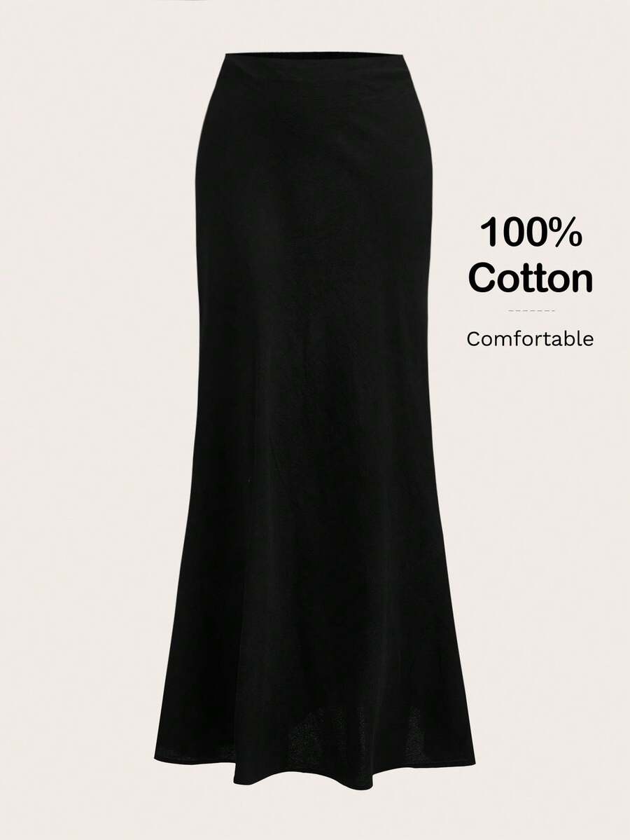 Women's black woven mermaid maxi skirt featuring a solid color design, mid waist, and 100% cotton fabric.