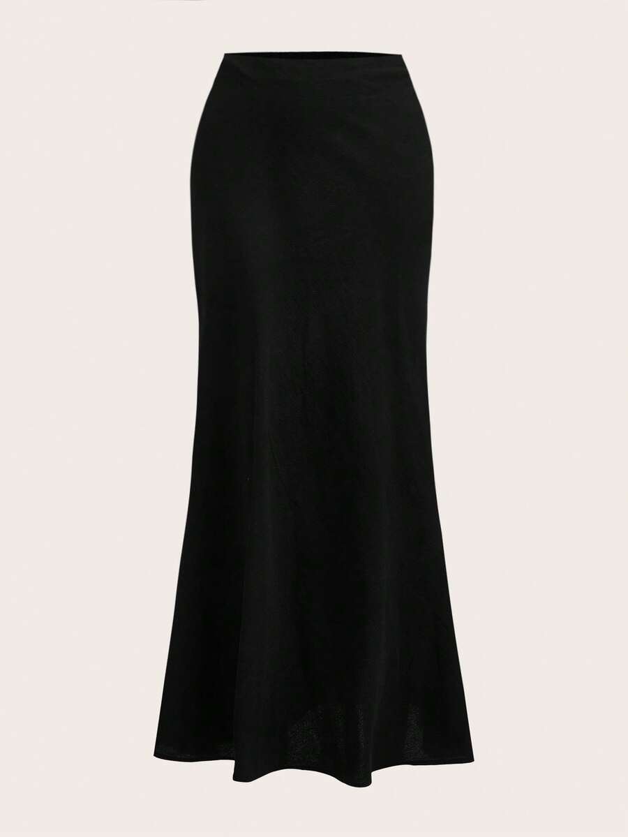 Women's black woven mermaid maxi skirt featuring a solid color design, mid waist, and 100% cotton fabric.
