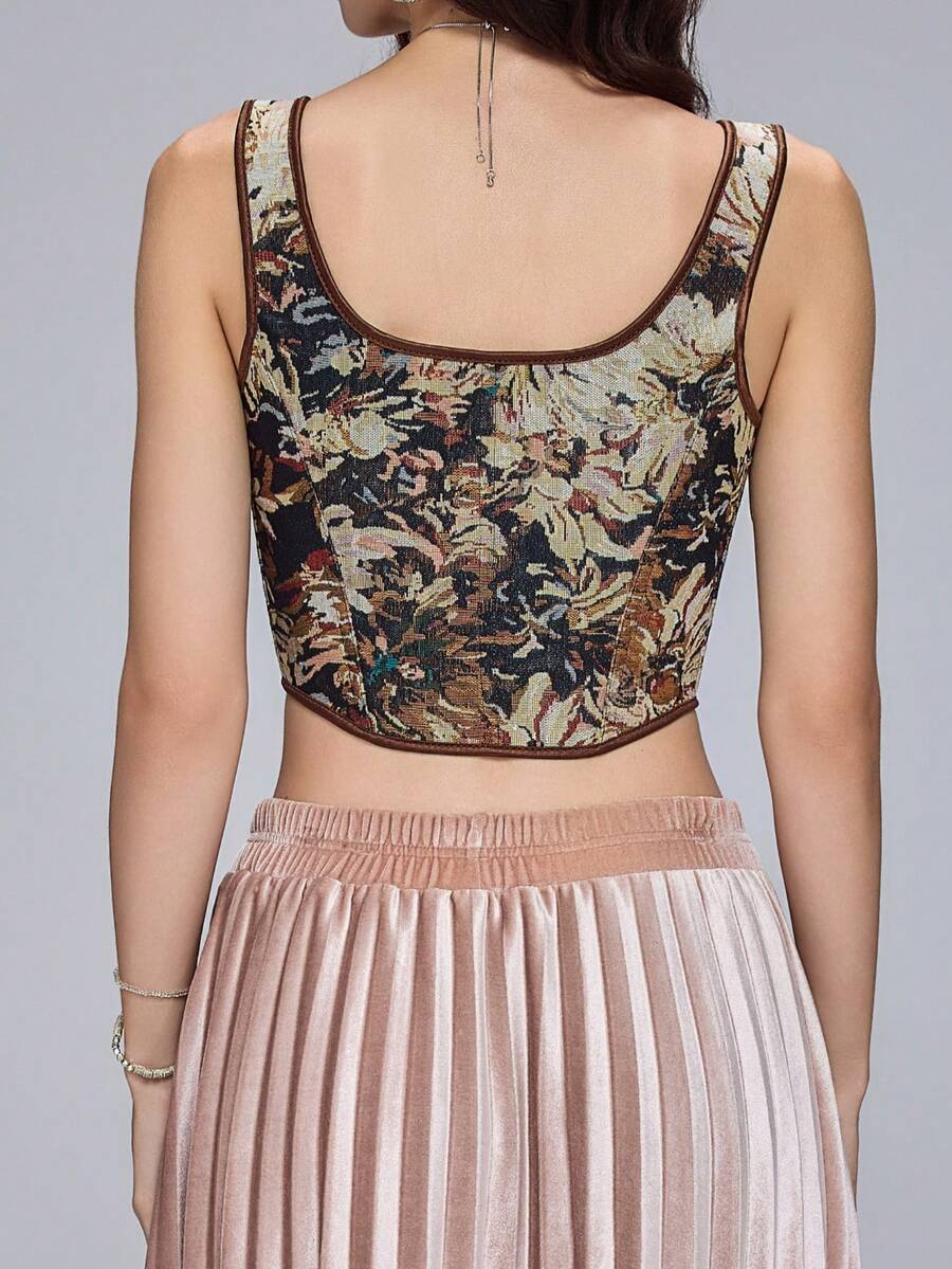 Women's retro floral print bustier top with shoulder straps, lace-up tie back, zipper, and boned construction in a romantic vintage style.