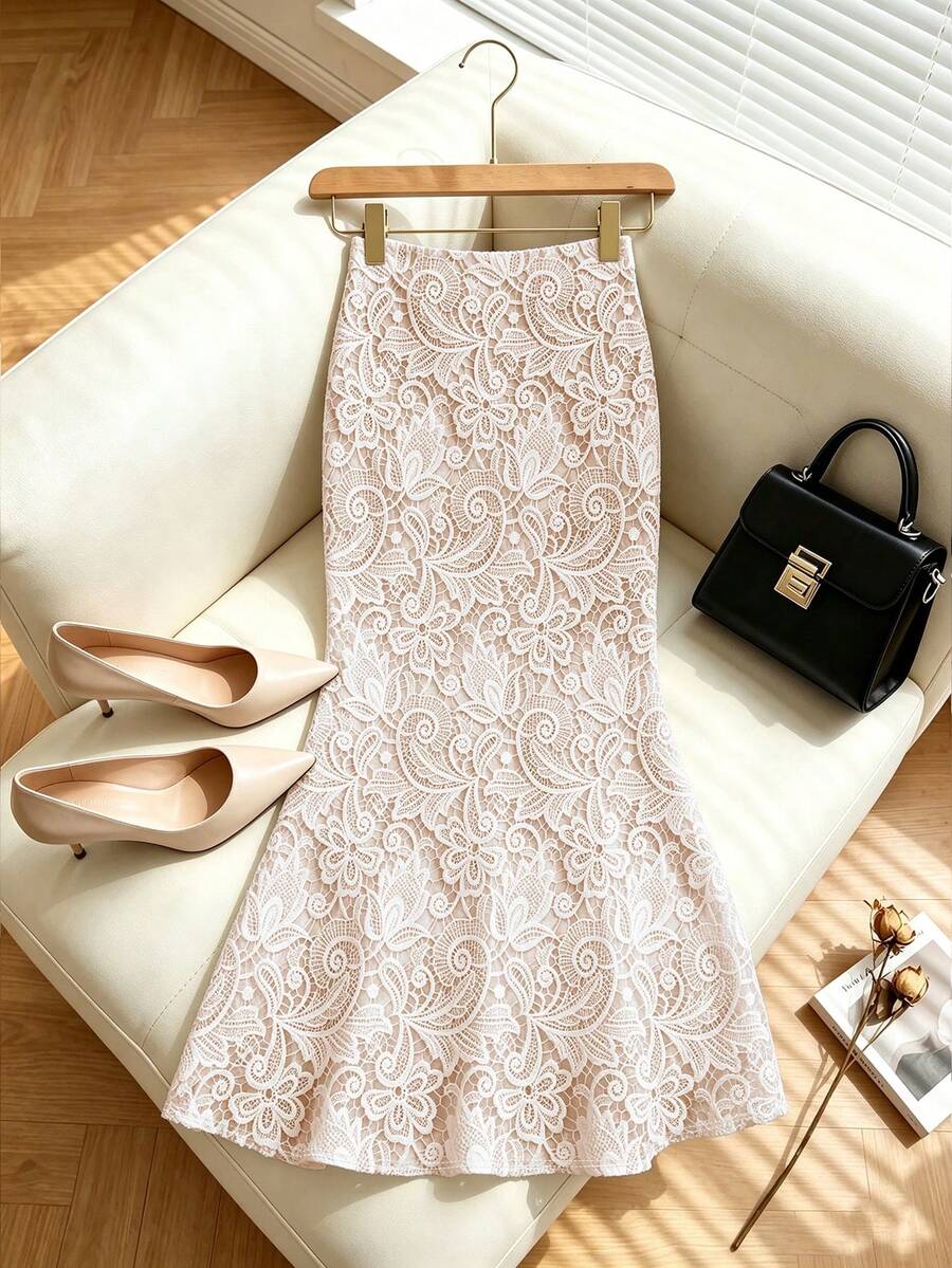 women's high-waist floral print mermaid maxi skirt in a flared knitted fabric silhouette.