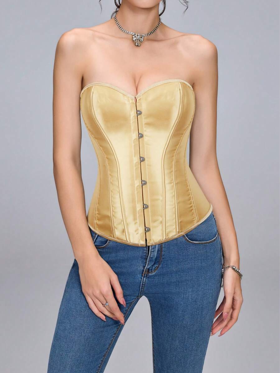 Blue satin bustier corset with front closure, back lace-up detail, and boned shaping for a retro-inspired party look.