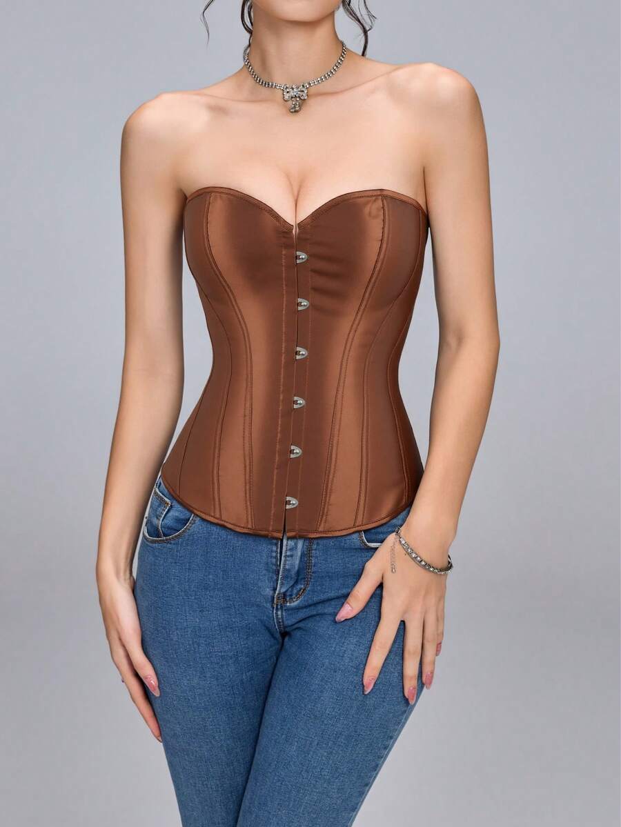 Blue satin bustier corset with front closure, back lace-up detail, and boned shaping for a retro-inspired party look.
