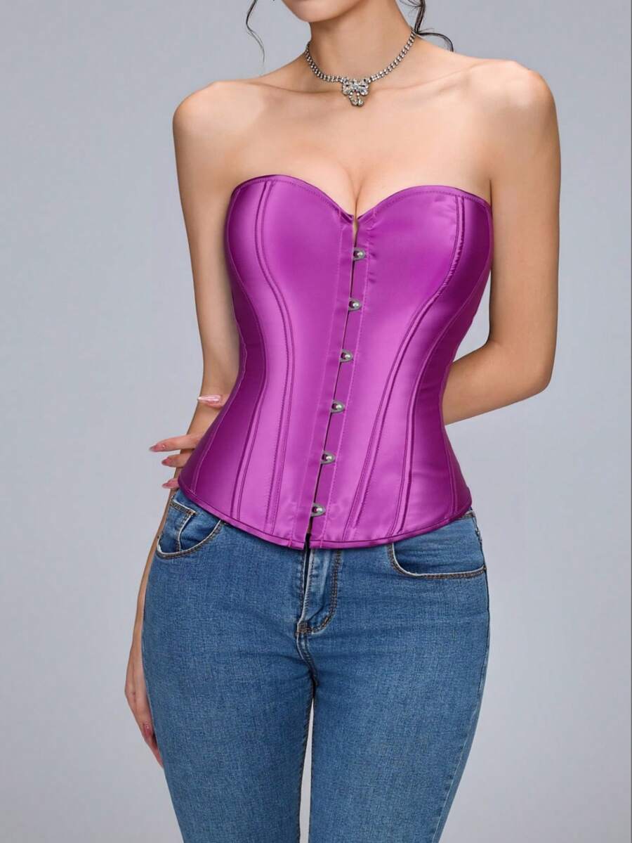 Blue satin bustier corset with front closure, back lace-up detail, and boned shaping for a retro-inspired party look.