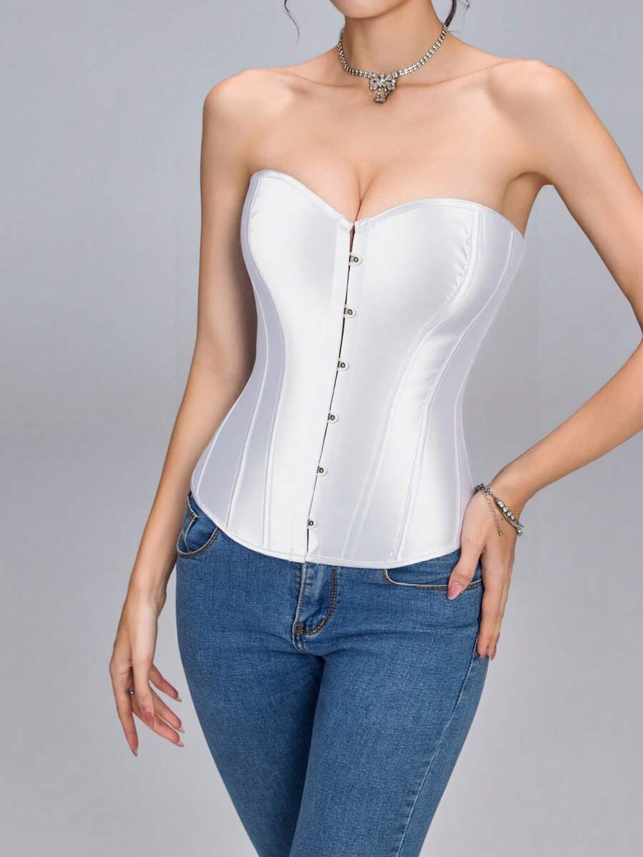 Blue satin bustier corset with front closure, back lace-up detail, and boned shaping for a retro-inspired party look.