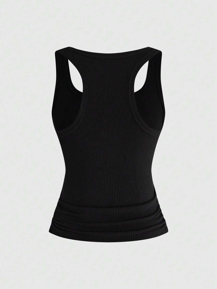 Black rib-knit scoop neck tank top featuring leopard print and graphic lettering for women.