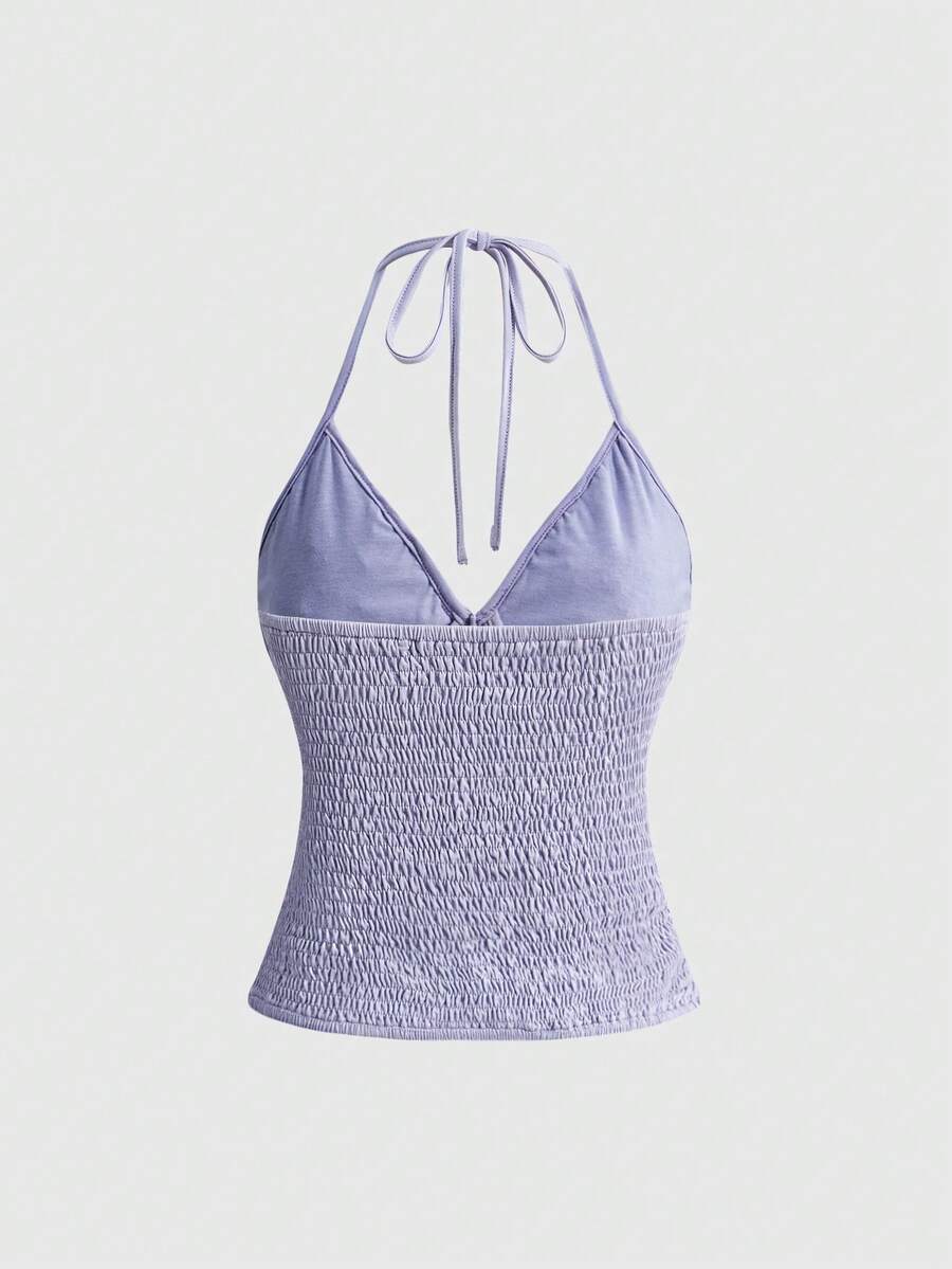 Women's floral embroidery backless halter crop top featuring contrast lace, ruched detailing, and slim fit in knitted pink fabric.