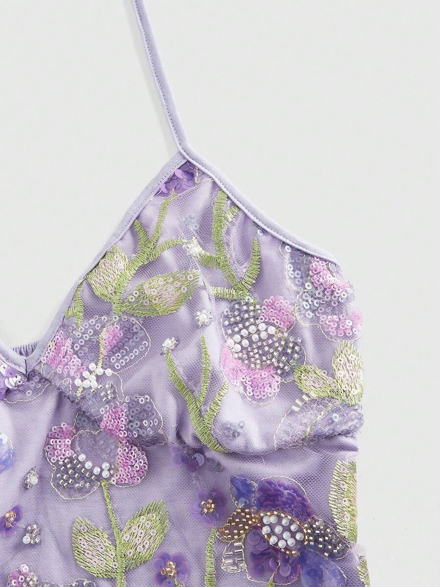 Women's floral embroidery backless halter crop top featuring contrast lace, ruched detailing, and slim fit in knitted pink fabric.