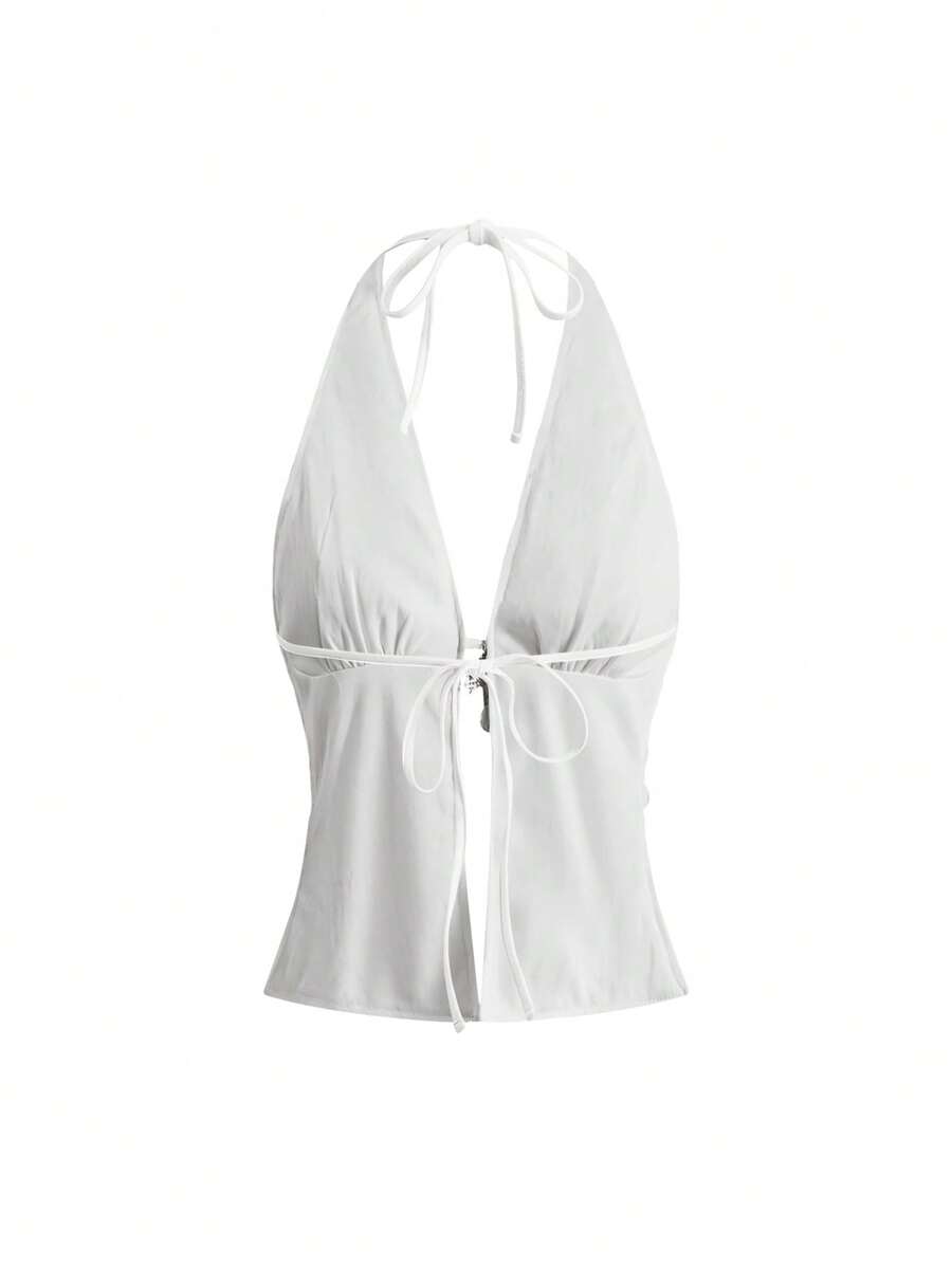 Women's white backless sequin halter neck tank top with knot details and slim fit boho style.