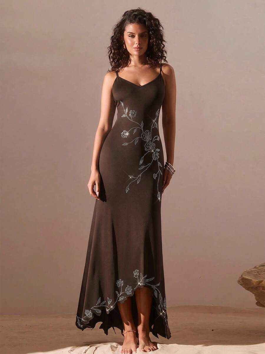 Black sleeveless asymmetrical cami maxi dress for women featuring spaghetti straps, 3D rose accent, arm sleeves, and a slim fit knitted design.