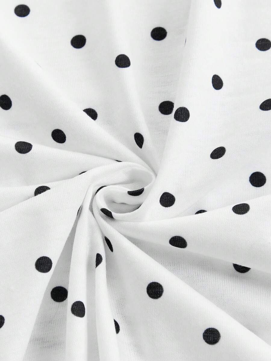 White slim fit square neck polka dot camisole top featuring cat and butterfly graphic print with studded arm sleeves.