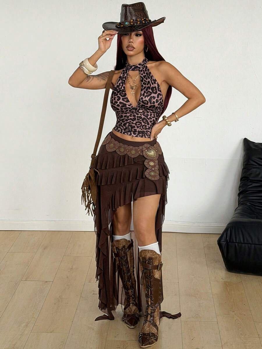 Women's low rise asymmetrical long skirt with tiered ruffle details in stretch knitted fabric.