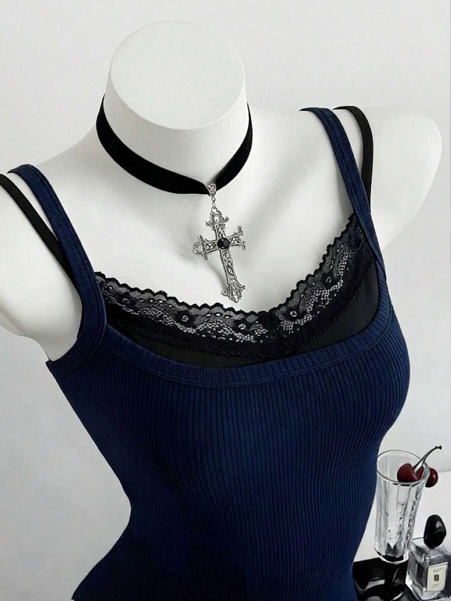 Women's slim fit spaghetti strap cami tank top with contrast lace trim along the neckline