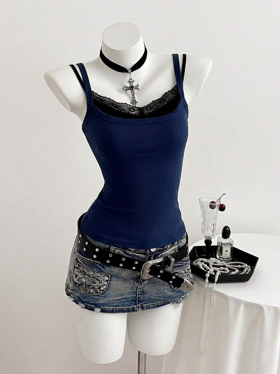 Women's slim fit spaghetti strap cami tank top with contrast lace trim along the neckline