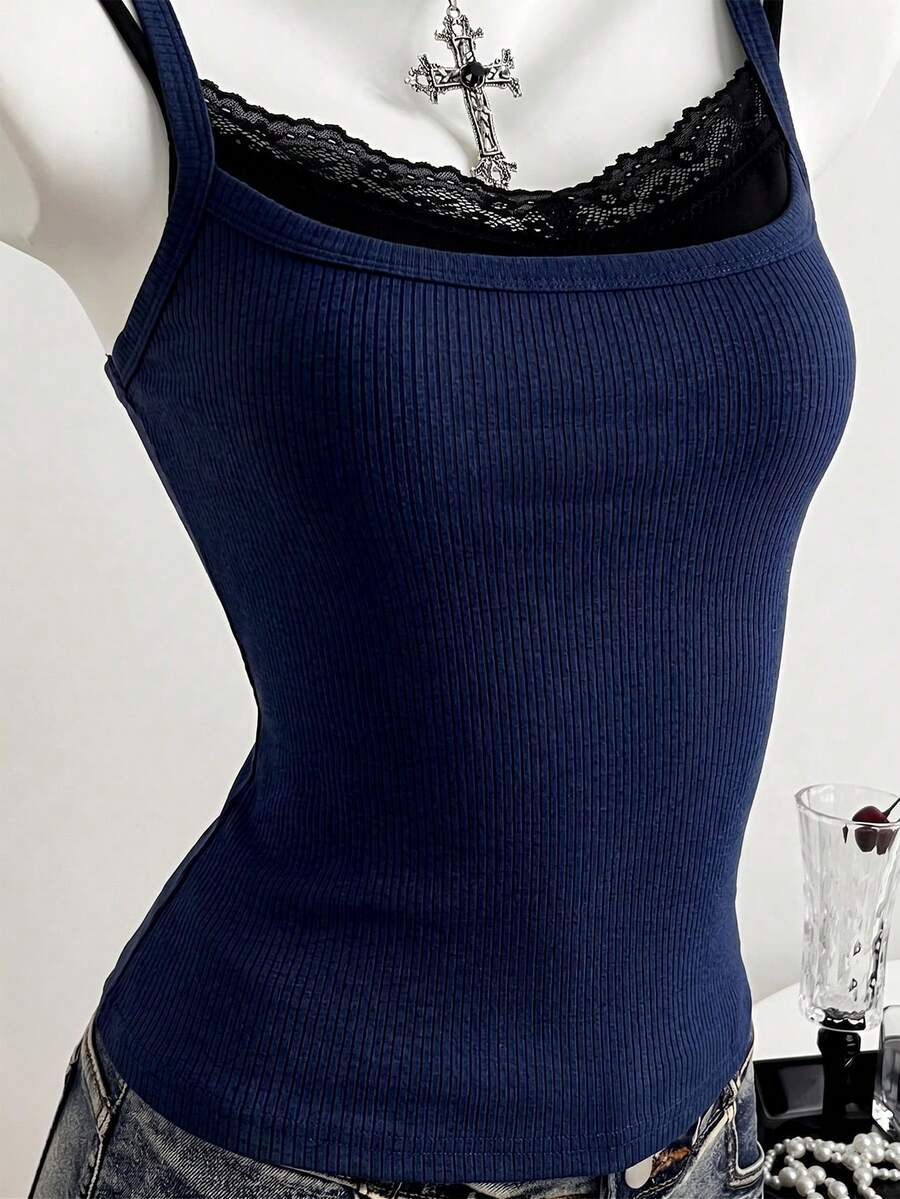 Women's slim fit spaghetti strap cami tank top with contrast lace trim along the neckline