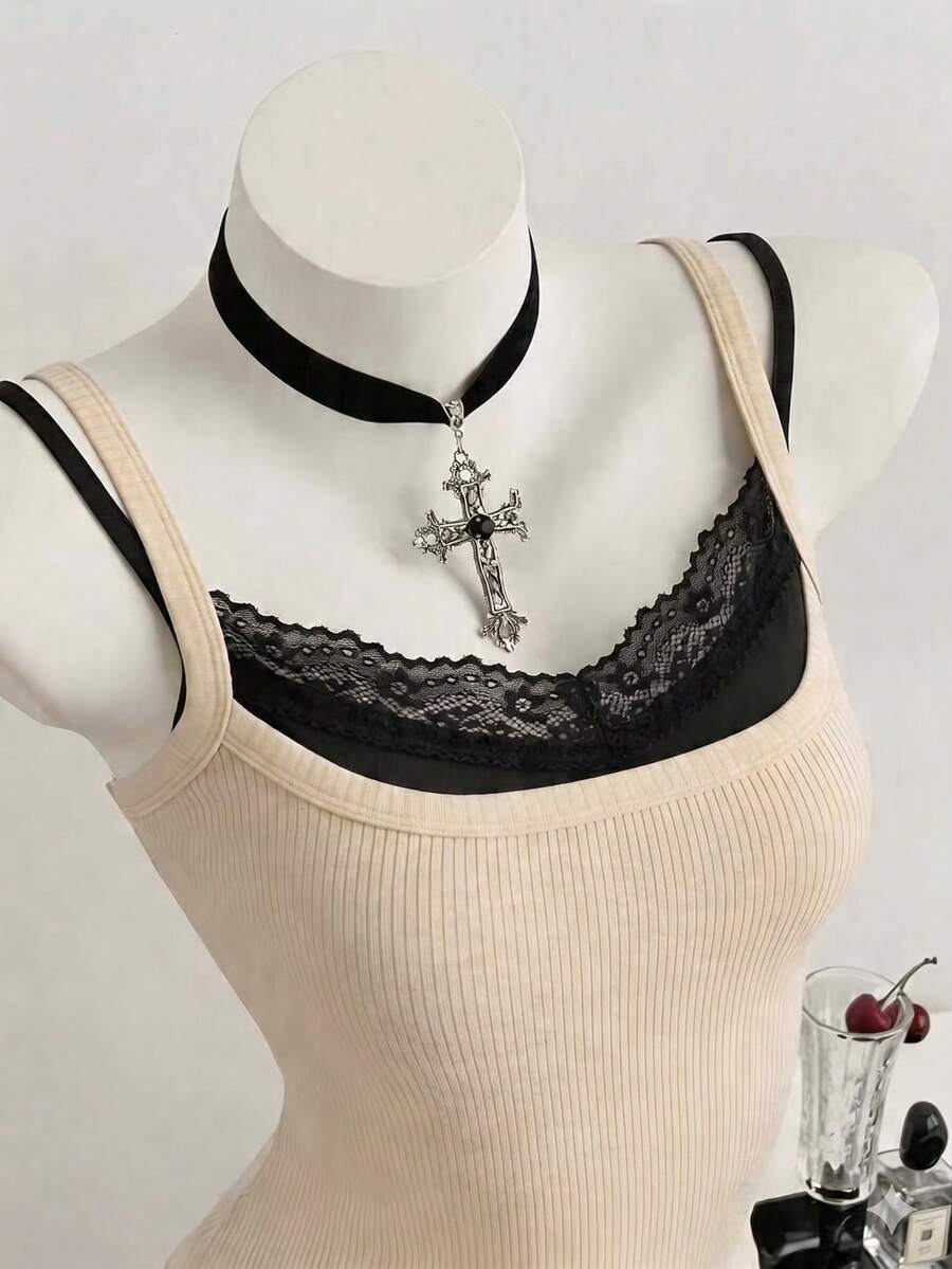 Women's slim fit spaghetti strap cami tank top with contrast lace trim along the neckline