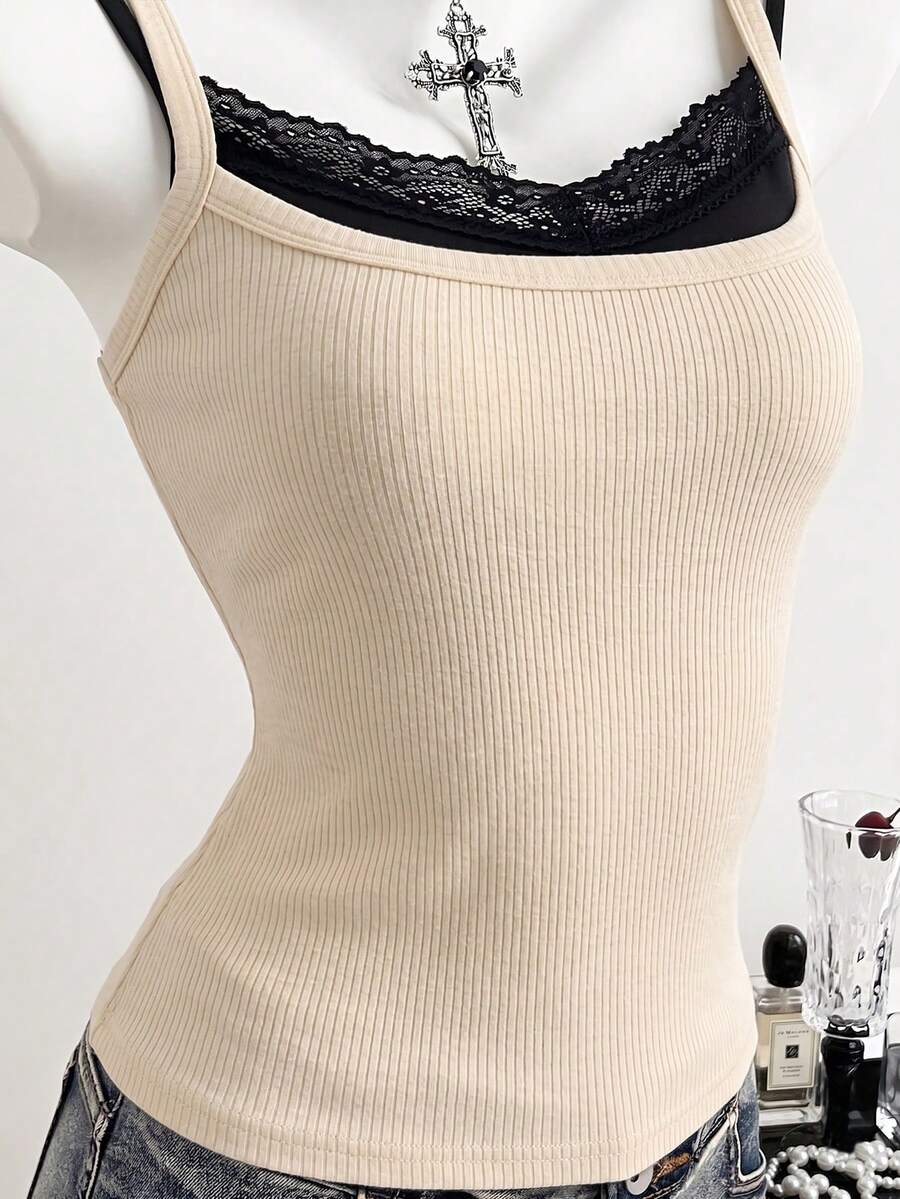 Women's slim fit spaghetti strap cami tank top with contrast lace trim along the neckline