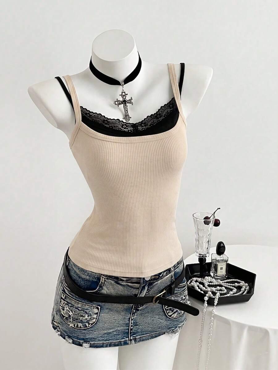 Women's slim fit spaghetti strap cami tank top with contrast lace trim along the neckline