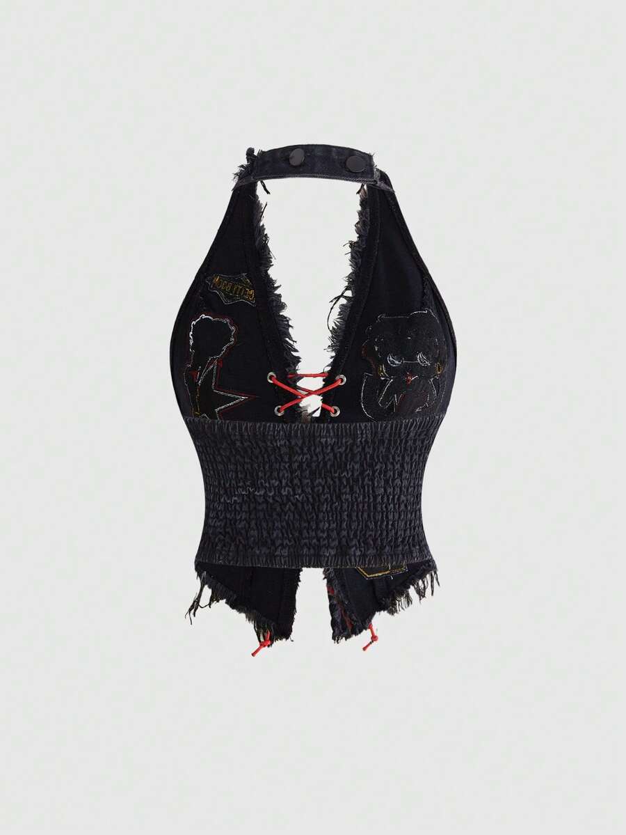 Black sleeveless denim halter top featuring a colorblock lace-up design and an asymmetrical hemline.
