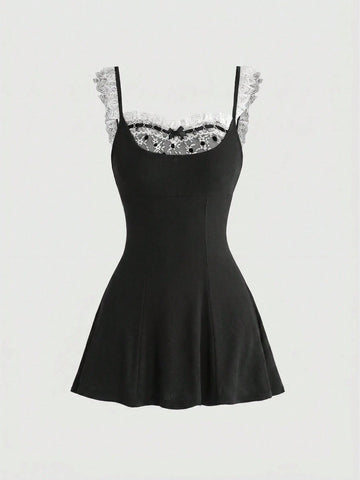 Women's sleeveless black colorblock cami mini dress with shoulder straps, frill detailing, slim fit waist, and flared hem.