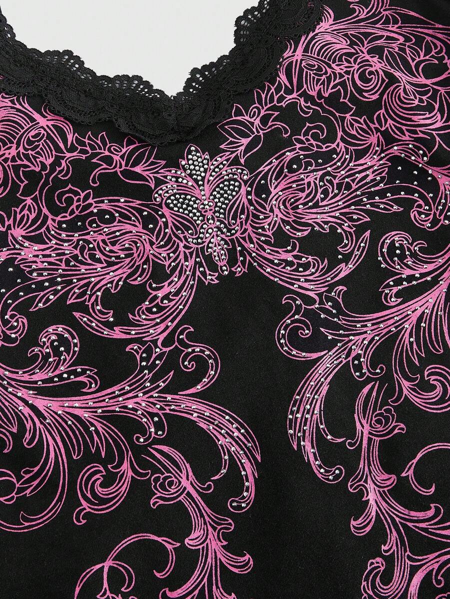 Pink floral print crop camisole top for women featuring contrast lace trim, spaghetti straps, and a slim fit.