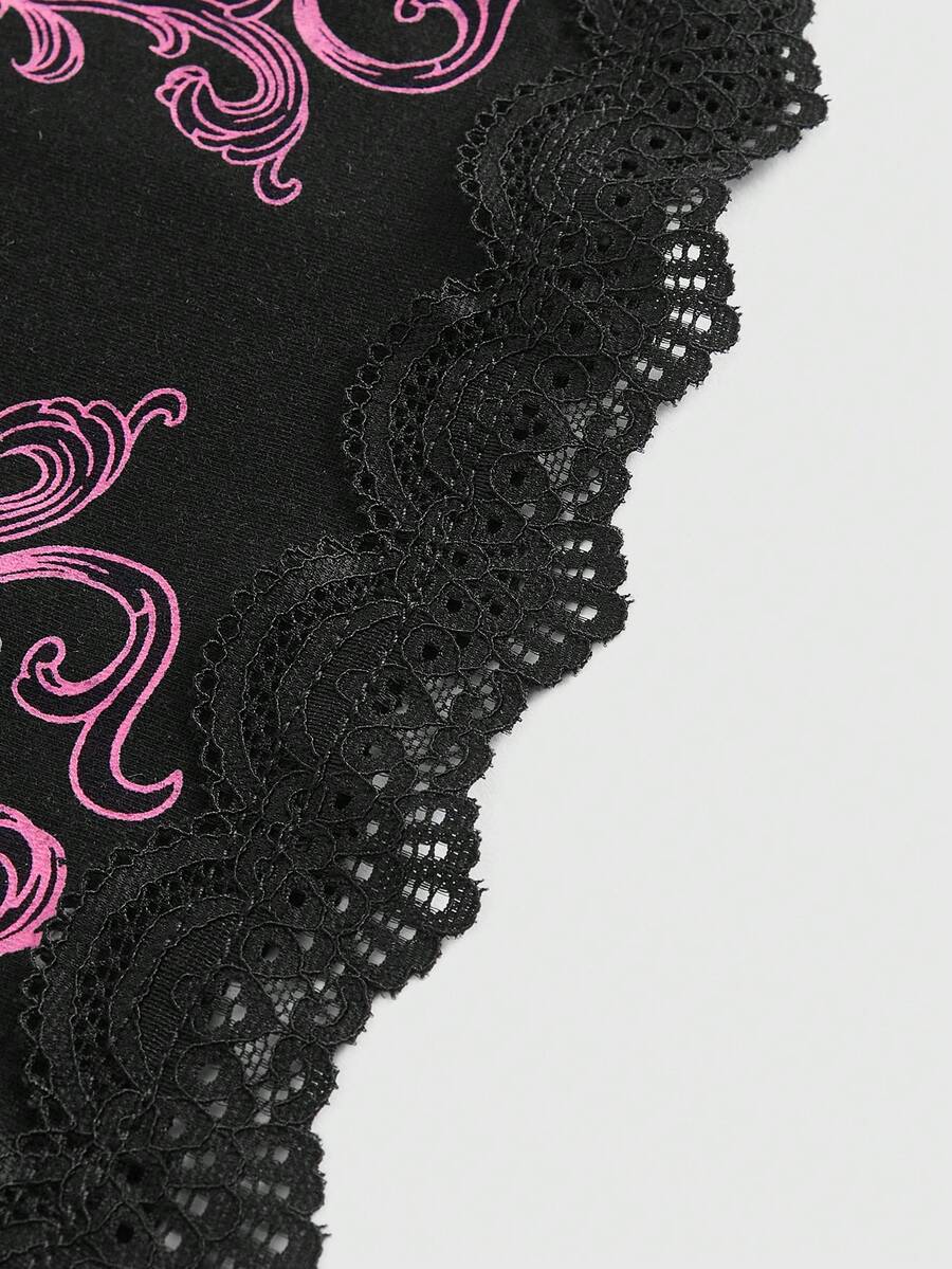 Pink floral print crop camisole top for women featuring contrast lace trim, spaghetti straps, and a slim fit.