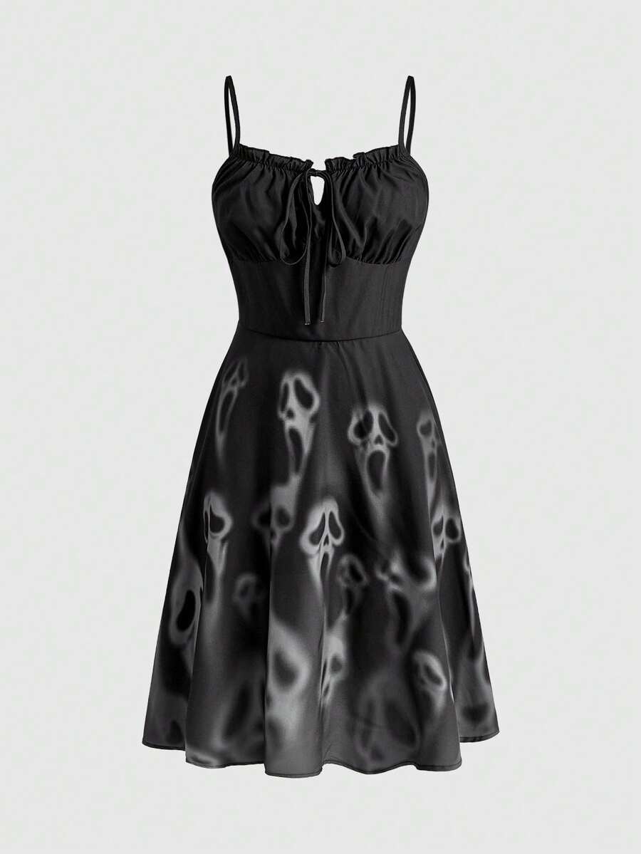 Women's black gothic mini dress with skull print, spaghetti straps, high waist, flared hem, and frill detail.