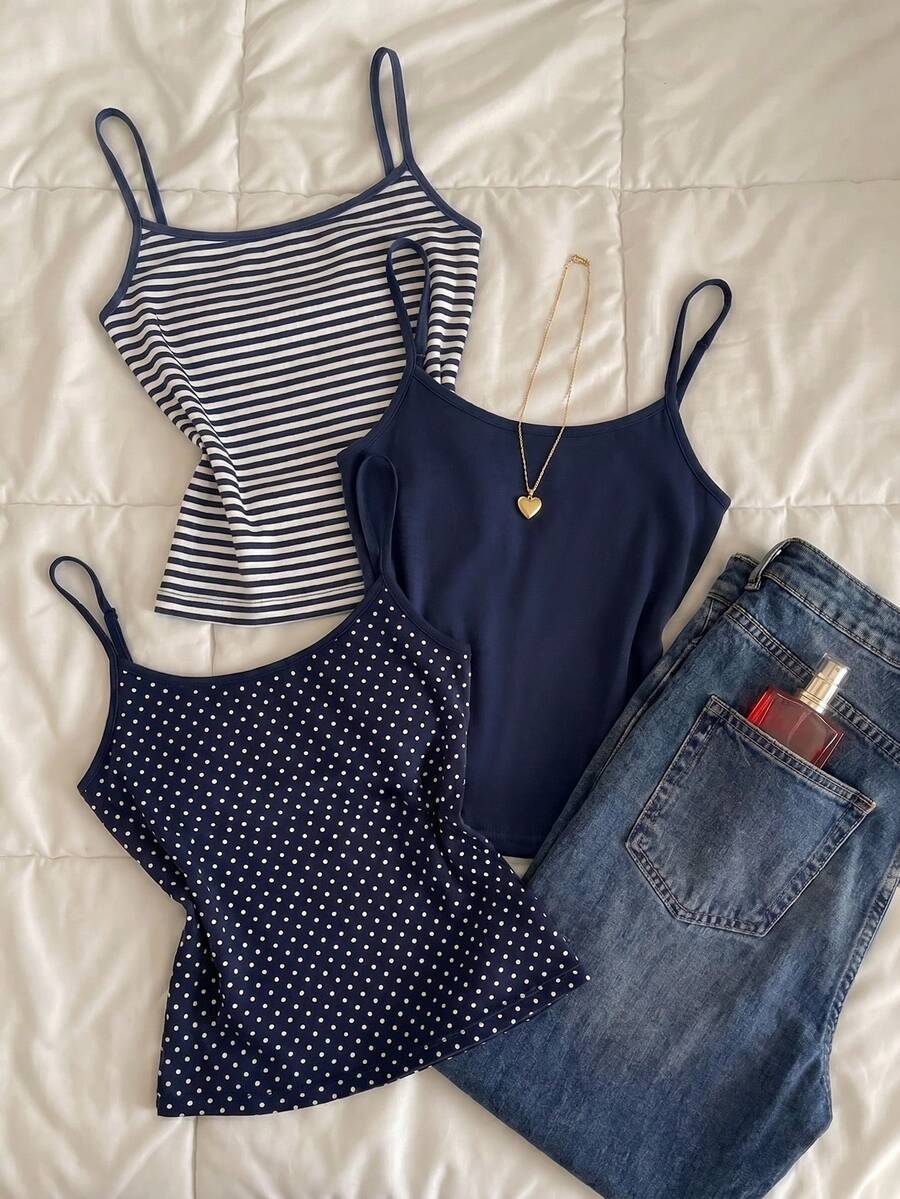 Navy blue women's geometric print spaghetti strap cami tank top with regular fit on plain background.