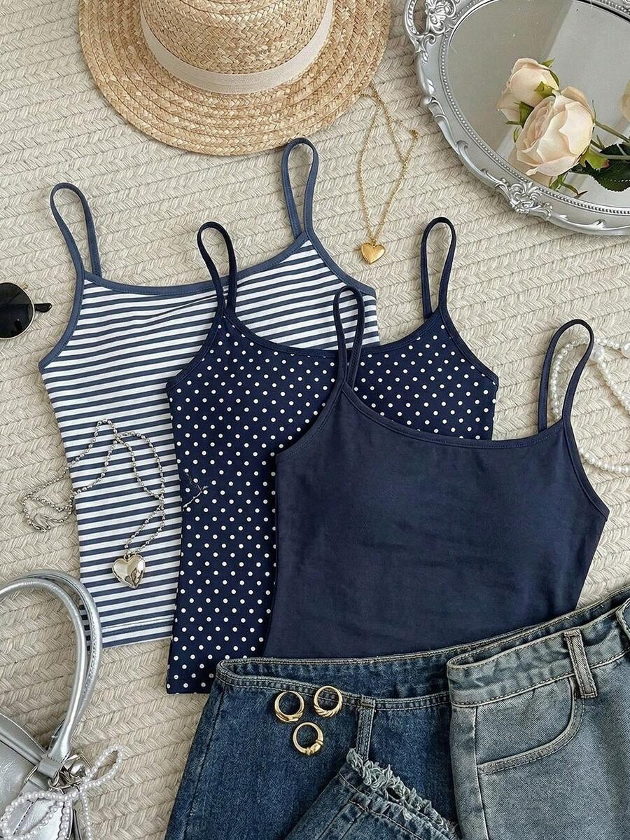 Navy blue women's geometric print spaghetti strap cami tank top with regular fit on plain background.