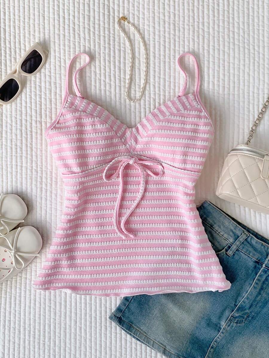Black and white polka dot tie strap camisole top for women with thin spaghetti straps and slim fit.